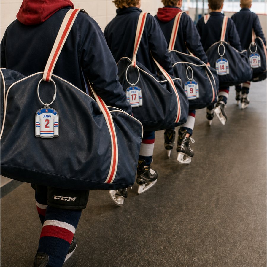 Youth hockey players walking with navy bags tagged with personalized jersey bag tags