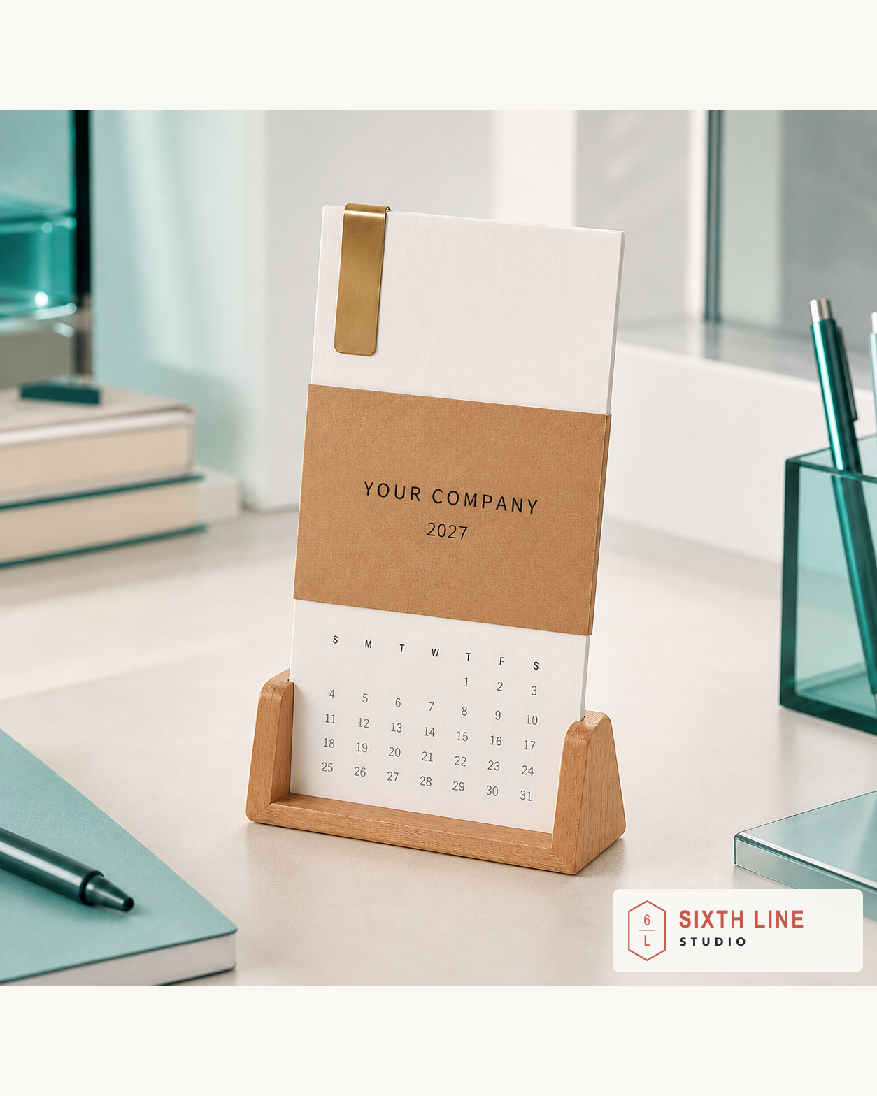 2027 custom desk calendar with a wooden base, metal clip and branded kraft band